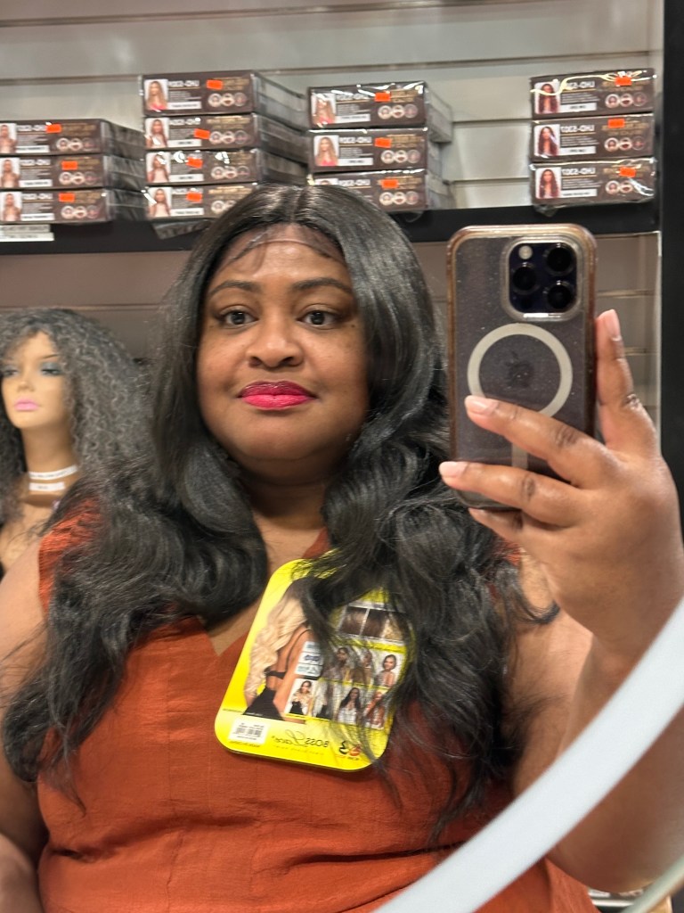 woman wearing long, black wig