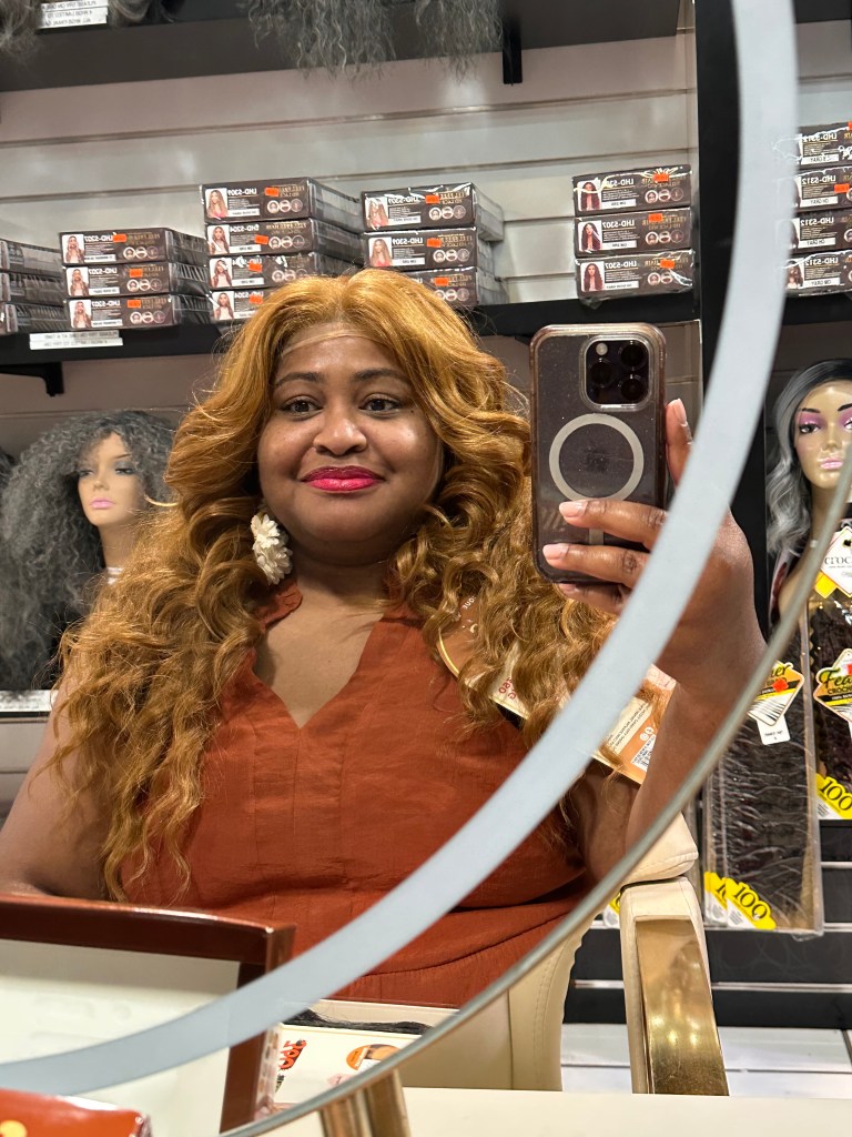 woman in a long, blonde wig