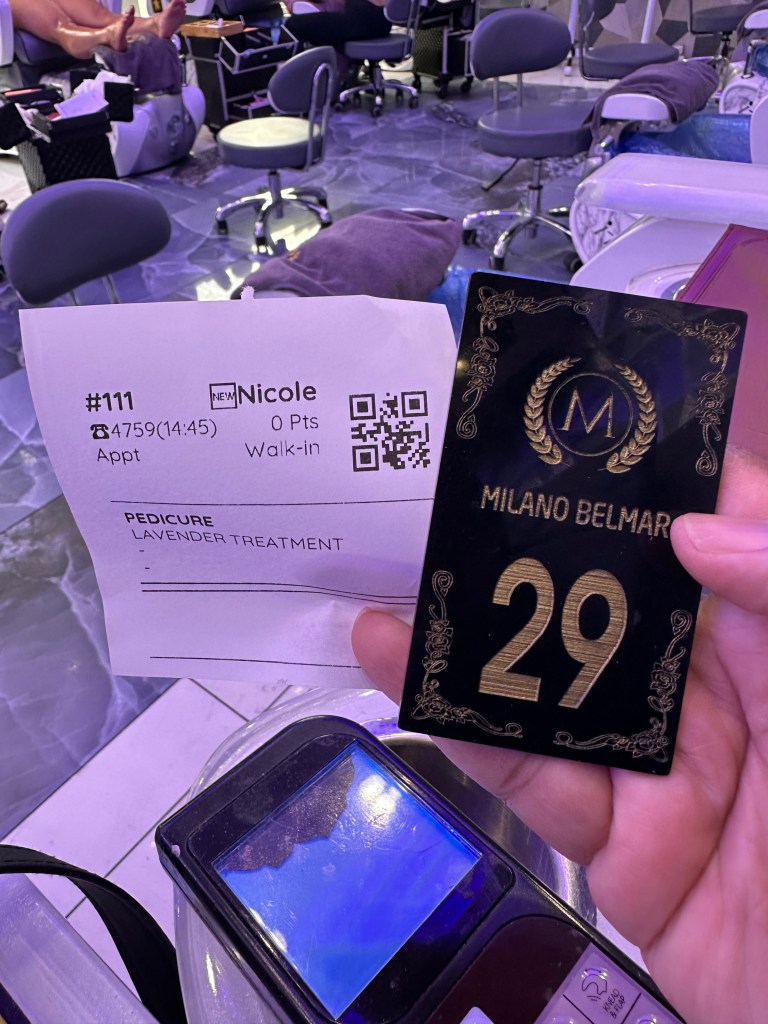 Image of a number and receipt from the Milano Belmar spa.