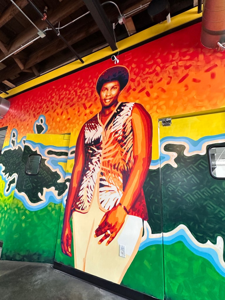 Large scale wall art at Welton Cafe in Denver, CO